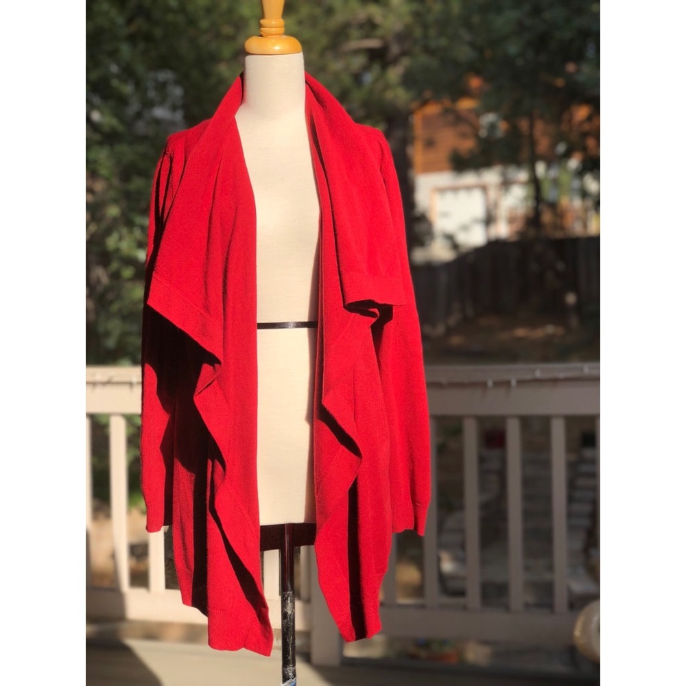 A red, flowing, thin, warm sweater.